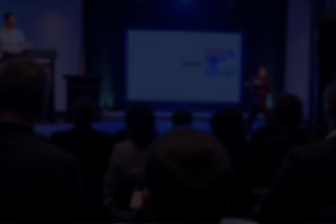Keynote speaker presenting at a corporate event